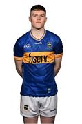 29 March 2025; Oisín O'Donoghue poses for a portrait during a Tipperary hurling squad portraits session at the Horse and Jockey Hotel in Tipperary. Photo by Piaras Ó Mídheach/Sportsfile