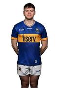 29 March 2025; Conor Stakelum poses for a portrait during a Tipperary hurling squad portraits session at the Horse and Jockey Hotel in Tipperary. Photo by Piaras Ó Mídheach/Sportsfile