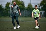 14 July 2025; Republic of Ireland U21's head coach Jim Crawford coaching Conall Geoghegan at a MiWadi FAI Football Camp at Tullamore Town FC in Tullamore, Offaly. Photo by Piaras Ó Mídheach/Sportsfile