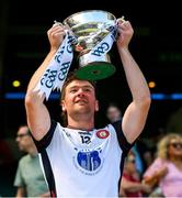 13 July 2025; Jack Healy of New York lifts the cup after the GAA Football All-Ireland Junior Championship final match between New York and London at Croke Park in Dublin. Photo by Ray McManus/Sportsfile
