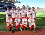 12 July 2025; The Tyrone team, back row from left; Logan Gibson, The Good Shepherd Primary School, Lucas O Cinsealaigh, Scoil Oilibheir, Cluain Saielach, Átha Cliath, Edwin Tynan, Church Hill National School, Sean Luke McCann, St. Oliver Plunkett's Primary School, Ballyhegan, Armagh, Harry Stranney, Cedar Integrated Primary School, Crossgar, Down, and Tadhg McCormack, St. Conleth's National School, Kildare and front row, from left; Jake Mallon, St. Malachy's Primary School, Chapel Lane, Armagh, Daniel Blake, Tinahely National School, Tinahely, Wicklow, Harry McVeigh, Bunscoil Bheanna Boirche, Castlewellan, Down, and Cillian Kearns, St. Bernard's Primary School, Wynchurch Walk, Antrim, before the GAA Football All-Ireland Senior Championship semi-final match between Kerry and Tyrone at Croke Park in Dublin. Photo by Piaras Ó Mídheach/Sportsfile
