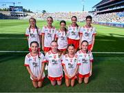 12 July 2025; The Tyrone team, back row from left; Megan McGowan, St Martin's Primary School, Garrison, Fermanagh, Hollie Mullen, Gaelscoil Bhaile Brigín, Baile Brigín, Co. Átha Cliath, Sienna Dillane, Blackwater National School, Enniscorthy, Wexford, Chloe Claasen, Cornafulla National School, Cornafulla, Roscommon, Shauna Halpin, Gilson National School, Oldcastle, Meath, and front row, from left; Ava Owens, St Mary's Primary School, Teemore, Fermanagh, Layla Grouse, St Vincent's Girls School, North William Street, Dublin, Zoey Clarke, St. Patrick's National School, Shercock, Cavan, Clara O'Neill, Mullaghbuoy National School, Riverstown, Louth, before the GAA Football All-Ireland Senior Championship semi-final match between Kerry and Tyrone at Croke Park in Dublin. Photo by Piaras Ó Mídheach/Sportsfile