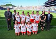 12 July 2025; Uachtarán Chumann Lúthchleas Gael Jarlath Burns, INTO President Anne Horan, LGFA President Trina Murray and Gary Farrell, President, Cumann na mBunscol with the Tyrone team; back row, from left; Megan McGowan, St Martin's Primary School, Garrison, Fermanagh, Hollie Mullen, Gaelscoil Bhaile Brigín, Baile Brigín, Co. Átha Cliath, Sienna Dillane, Blackwater National School, Enniscorthy, Wexford, Chloe Claasen, Cornafulla National School, Cornafulla, Roscommon, and Shauna Halpin, Gilson National School, Oldcastle, Meath, and front row, from left, Ava Owens, St Mary's Primary School, Teemore, Fermanagh, Layla Grouse, St Vincent's Girls School, North William Street, Dublin, Zoey Clarke, St. Patrick's National School, Shercock, Cavan, and Clara O'Neill, Mullaghbuoy National School, Riverstown, Louth, before the GAA INTO Cumann na mBunscol Respect Exhibition Go Games at the GAA Football All-Ireland Senior Championship semi-final match between Meath and Donegal at Croke Park in Dublin.  Photo by Piaras Ó Mídheach/Sportsfile