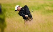 15 July 2025; Rory McIlroy of Northern Ireland plays a shot on the 12th fairway during a practice round at Royal Portrush Golf Club in Portrush, Antrim, ahead of The 153rd Open Championship. Photo by Ramsey Cardy/Sportsfile