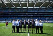 12 July 2025; Referee Liam Devenney with his match officials before the Tailteann Cup final match between Kildare and Limerick at Croke Park in Dublin. Photo by Piaras Ó Mídheach/Sportsfile