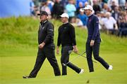15 July 2025; Rory McIlroy of Northern Ireland, centre, with Darren Clarke of Northern Ireland, left, and Tom McKibbin of Northern Ireland during a practice round at Royal Portrush Golf Club in Portrush, Antrim, ahead of The 153rd Open Championship. Photo by Ramsey Cardy/Sportsfile