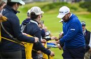 15 July 2025; Shane Lowry of Ireland with supporters during a practice round at Royal Portrush Golf Club in Portrush, Antrim, ahead of The 153rd Open Championship. Photo by Ramsey Cardy/Sportsfile