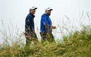 15 July 2025; Shane Lowry of Ireland, right, and Collin Morikawa of USA during a practice round at Royal Portrush Golf Club in Portrush, Antrim, ahead of The 153rd Open Championship. Photo by Ramsey Cardy/Sportsfile