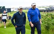 15 July 2025; Shane Lowry of Ireland, right, and Collin Morikawa of USA during a practice round at Royal Portrush Golf Club in Portrush, Antrim, ahead of The 153rd Open Championship. Photo by Ramsey Cardy/Sportsfile
