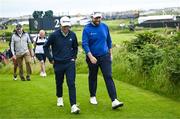 15 July 2025; Shane Lowry of Ireland, right, and Collin Morikawa of USA during a practice round at Royal Portrush Golf Club in Portrush, Antrim, ahead of The 153rd Open Championship. Photo by Ramsey Cardy/Sportsfile