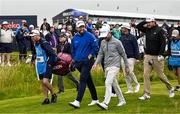 15 July 2025; Shane Lowry of Ireland, centre, with Brian Harman of USA during a practice round at Royal Portrush Golf Club in Portrush, Antrim, ahead of The 153rd Open Championship. Photo by Ramsey Cardy/Sportsfile
