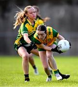 15 July 2025; Orla Ward of Donegal is tackled by Kate Kenny of Leitrim during LGFA All-Ireland U16 C Championship final match between Donegal and Leitrim at Tempo Maguires GAC in Tempo, Fermanagh. Photo by Ben McShane/Sportsfile