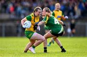 15 July 2025; Mia O'Donnell of Donegal is tackled by Kate Kenny of Leitrim during LGFA All-Ireland U16 C Championship final match between Donegal and Leitrim at Tempo Maguires GAC in Tempo, Fermanagh. Photo by Ben McShane/Sportsfile