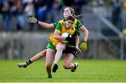 15 July 2025; Eva McNamara of Donegal is tackled by Eibhlin Guckian of Leitrim during LGFA All-Ireland U16 C Championship final match between Donegal and Leitrim at Tempo Maguires GAC in Tempo, Fermanagh. Photo by Ben McShane/Sportsfile