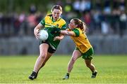 15 July 2025; Lucie Maye of Leitrim is tackled by Rachel Gillespie of Donegal during LGFA All-Ireland U16 C Championship final match between Donegal and Leitrim at Tempo Maguires GAC in Tempo, Fermanagh. Photo by Ben McShane/Sportsfile