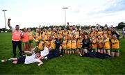 15 July 2025; Donegal players and staff celebrate with the cup after LGFA All-Ireland U16 C Championship final match between Donegal and Leitrim at Tempo Maguires GAC in Tempo, Fermanagh. Photo by Ben McShane/Sportsfile