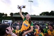 15 July 2025; Donegal captain Laura Boyle celebrates with the cup and her teammates after LGFA All-Ireland U16 C Championship final match between Donegal and Leitrim at Tempo Maguires GAC in Tempo, Fermanagh. Photo by Ben McShane/Sportsfile