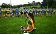 15 July 2025; Leitrim players looks on as Donegal captain Laura Boyle makes a speech after LGFA All-Ireland U16 C Championship final match between Donegal and Leitrim at Tempo Maguires GAC in Tempo, Fermanagh. Photo by Ben McShane/Sportsfile