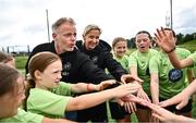 16 July 2025; Republic of Ireland WNT head coach Carla Ward and Republic of Ireland WNT assistant head coach Alan Mahon with players on a visit to the MiWadi FAI Football Camp at Leixlip United in Collinstown, Kildare. Photo by Piaras Ó Mídheach/Sportsfile
