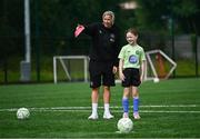 16 July 2025; Republic of Ireland WNT head coach Carla Ward with Maggie Homan on a visit to the MiWadi FAI Football Camp at Leixlip United in Collinstown, Kildare. Photo by Piaras Ó Mídheach/Sportsfile