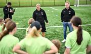 16 July 2025; Republic of Ireland WNT head coach Carla Ward and Republic of Ireland WNT assistant head coach Alan Mahon with players on a visit to the MiWadi FAI Football Camp at Leixlip United in Collinstown, Kildare. Photo by Piaras Ó Mídheach/Sportsfile