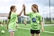 16 July 2025; Maggie Homan, left, and Amy Mooney during the MiWadi FAI Football Camp at Leixlip United in Collinstown, Kildare. Photo by Piaras Ó Mídheach/Sportsfile