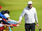 16 July 2025; Scottie Scheffler of USA with supporters during a practice round at Royal Portrush Golf Club in Portrush, Antrim, ahead of The 153rd Open Championship. Photo by David Fitzgerald/Sportsfile