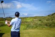 16 July 2025; A general view of the seventh hole as Justin Rose of England watches his tee shot during a practice round at Royal Portrush Golf Club in Portrush, Antrim, ahead of The 153rd Open Championship. Photo by Ramsey Cardy/Sportsfile