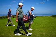 16 July 2025; Brooks Koepka of USA with his caddie Ricky Elliott on the fifth tee box during a practice round at Royal Portrush Golf Club in Portrush, Antrim, ahead of The 153rd Open Championship. Photo by Ramsey Cardy/Sportsfile