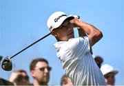 16 July 2025; Collin Morikawa of USA watches his tee shot on the 14th hole during a practice round at Royal Portrush Golf Club in Portrush, Antrim, ahead of The 153rd Open Championship. Photo by David Fitzgerald/Sportsfile