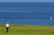 16 July 2025; Rory McIlroy of Northern Ireland walks onto a green during a practice round at Royal Portrush Golf Club in Portrush, Antrim, ahead of The 153rd Open Championship. Photo by Ramsey Cardy/Sportsfile