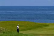16 July 2025; Rory McIlroy of Northern Ireland walks onto a green during a practice round at Royal Portrush Golf Club in Portrush, Antrim, ahead of The 153rd Open Championship. Photo by Ramsey Cardy/Sportsfile