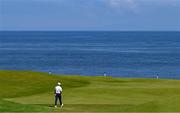 16 July 2025; Rory McIlroy of Northern Ireland walks onto a green during a practice round at Royal Portrush Golf Club in Portrush, Antrim, ahead of The 153rd Open Championship. Photo by Ramsey Cardy/Sportsfile
