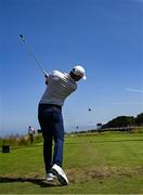 16 July 2025; Rory McIlroy of Northern Ireland plays his tee shot during a practice round at Royal Portrush Golf Club in Portrush, Antrim, ahead of The 153rd Open Championship. Photo by Ramsey Cardy/Sportsfile
