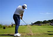 16 July 2025; Rory McIlroy of Northern Ireland plays his tee shot during a practice round at Royal Portrush Golf Club in Portrush, Antrim, ahead of The 153rd Open Championship. Photo by Ramsey Cardy/Sportsfile