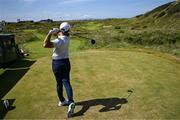 16 July 2025; Rory McIlroy of Northern Ireland watches his tee shot on the seventh hole during a practice round at Royal Portrush Golf Club in Portrush, Antrim, ahead of The 153rd Open Championship. Photo by Ramsey Cardy/Sportsfile