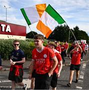 16 July 2025; Shelbourne supporters arrive before the UEFA Champions League First Qualifying Round second leg match between Linfield and Shelbourne at Clearer Twist National Football Stadium at Windsor Park in Belfast. Photo by Ben McShane/Sportsfile