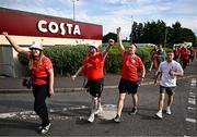 16 July 2025; Shelbourne supporters arrive before the UEFA Champions League First Qualifying Round second leg match between Linfield and Shelbourne at Clearer Twist National Football Stadium at Windsor Park in Belfast. Photo by Ben McShane/Sportsfile