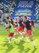 16 July 2025; Sean Boyd of Shelbourne and teammates warm up before the UEFA Champions League First Qualifying Round second leg match between Linfield and Shelbourne at Clearer Twist National Football Stadium at Windsor Park in Belfast. Photo by Stephen McCarthy/Sportsfile