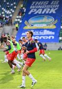16 July 2025; Sean Boyd of Shelbourne and teammates warm up before the UEFA Champions League First Qualifying Round second leg match between Linfield and Shelbourne at Clearer Twist National Football Stadium at Windsor Park in Belfast. Photo by Stephen McCarthy/Sportsfile