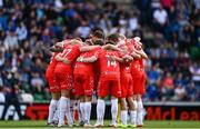 16 July 2025; Shelbourne players huddle before the UEFA Champions League First Qualifying Round second leg match between Linfield and Shelbourne at Clearer Twist National Football Stadium at Windsor Park in Belfast. Photo by Ben McShane/Sportsfile