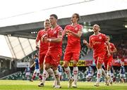 16 July 2025; Ali Coote of Shelbourne celebrates with teammates JJ Lunney and Harry Wood after scoring his side's first goal during the UEFA Champions League First Qualifying Round second leg match between Linfield and Shelbourne at Clearer Twist National Football Stadium at Windsor Park in Belfast. Photo by Ben McShane/Sportsfile