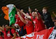 16 July 2025; Shelbourne supporters celebrate their side's first goal during the UEFA Champions League First Qualifying Round second leg match between Linfield and Shelbourne at Clearer Twist National Football Stadium at Windsor Park in Belfast. Photo by Stephen McCarthy/Sportsfile