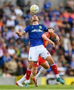 16 July 2025; Matthew Fitzpatrick of Linfield in action against Kameron Ledwidge of Shelbourne during the UEFA Champions League First Qualifying Round second leg match between Linfield and Shelbourne at Clearer Twist National Football Stadium at Windsor Park in Belfast. Photo by Stephen McCarthy/Sportsfile