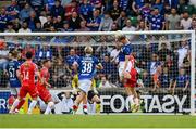 16 July 2025; Tyreke Wilson of Shelbourne is deemed to handle the ball under pressure from Ben Hall of Linfield resulting in a penalty during the UEFA Champions League First Qualifying Round second leg match between Linfield and Shelbourne at Clearer Twist National Football Stadium at Windsor Park in Belfast. Photo by Stephen McCarthy/Sportsfile