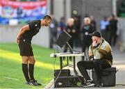 16 July 2025; Referee Andrew Madley reviews a Shelbourne goal on the VAR monitor before ruling the goal out during the UEFA Champions League First Qualifying Round second leg match between Linfield and Shelbourne at Clearer Twist National Football Stadium at Windsor Park in Belfast. Photo by Stephen McCarthy/Sportsfile