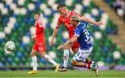 16 July 2025; JJ Lunney of Shelbourne in action against Callumn Morrison of Linfield during the UEFA Champions League First Qualifying Round second leg match between Linfield and Shelbourne at Clearer Twist National Football Stadium at Windsor Park in Belfast. Photo by Stephen McCarthy/Sportsfile