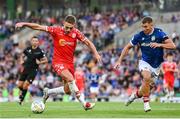 16 July 2025; Evan Caffrey of Shelbourne in action against Ethan McGee of Linfield during the UEFA Champions League First Qualifying Round second leg match between Linfield and Shelbourne at Clearer Twist National Football Stadium at Windsor Park in Belfast. Photo by Stephen McCarthy/Sportsfile