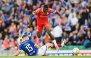 16 July 2025; Ben Hall of Linfield tackles Mipo Odubeko of Shelbourne, resulting in a red card, during the UEFA Champions League First Qualifying Round second leg match between Linfield and Shelbourne at Clearer Twist National Football Stadium at Windsor Park in Belfast. Photo by Stephen McCarthy/Sportsfile