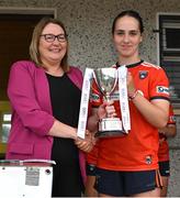 16 July 2025; Armagh captain Lily McBennett is presented with the cup by LGFA President Trina Murray after the LGFA All-Ireland U16 B Championship final match between Armagh and Galway at Glennon Brothers Pearse Park in Longford. Photo by Stephen Marken/Sportsfile